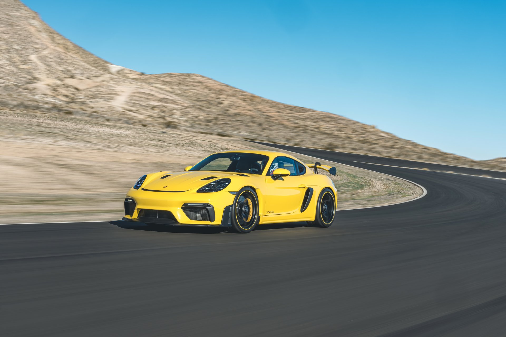 Yellow Porsche 718 Cayman GT4